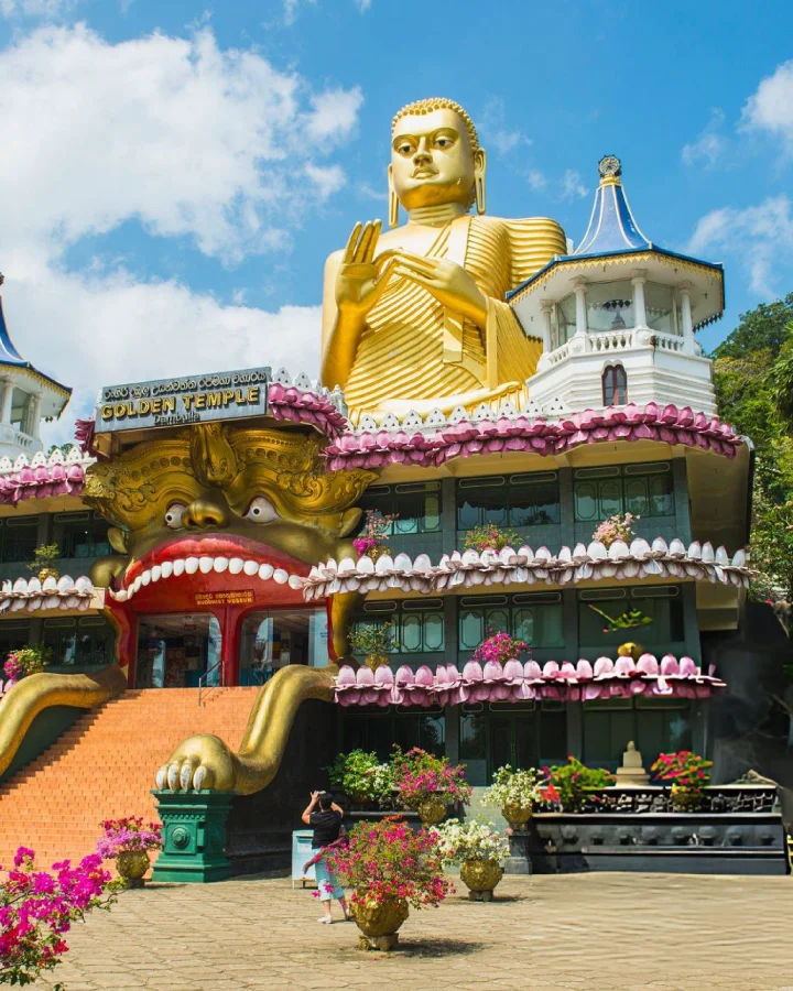 Golden Buddha statue at the Dambulla Golden Temple complex in Sri Lanka