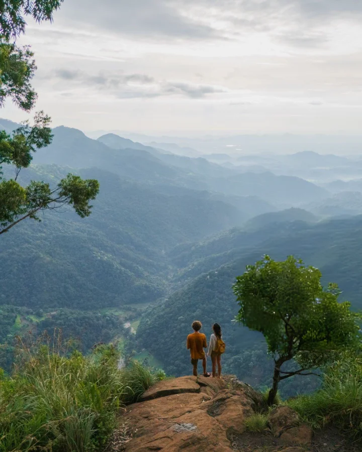 toursit standing on mini adams peak view point